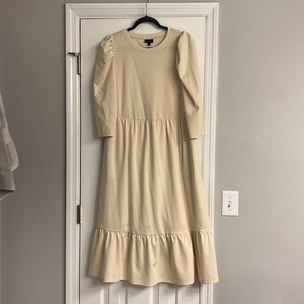 Cream quarter length sleeve dress